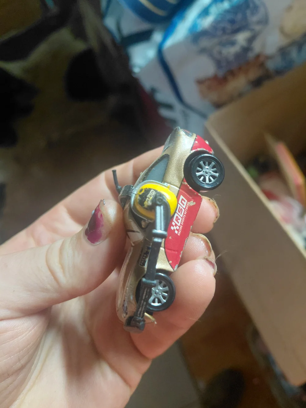 diecast toy is a 1:55 scale Mattel Disney Pixar Cars character named Shannon Spo